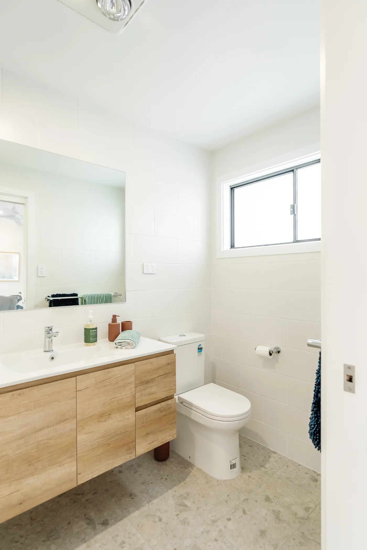 Bathroom with vanity and window