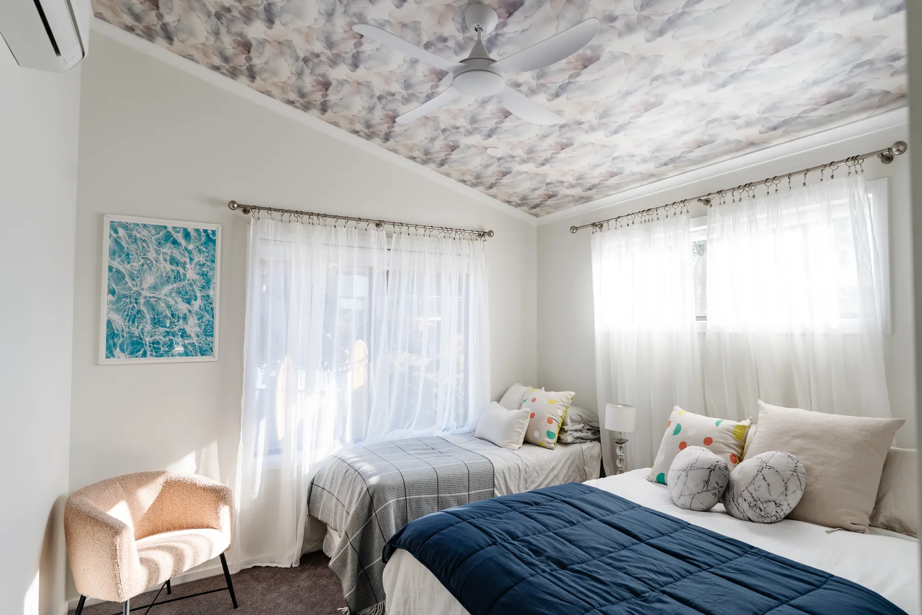 Twin room with watercolour ceiling