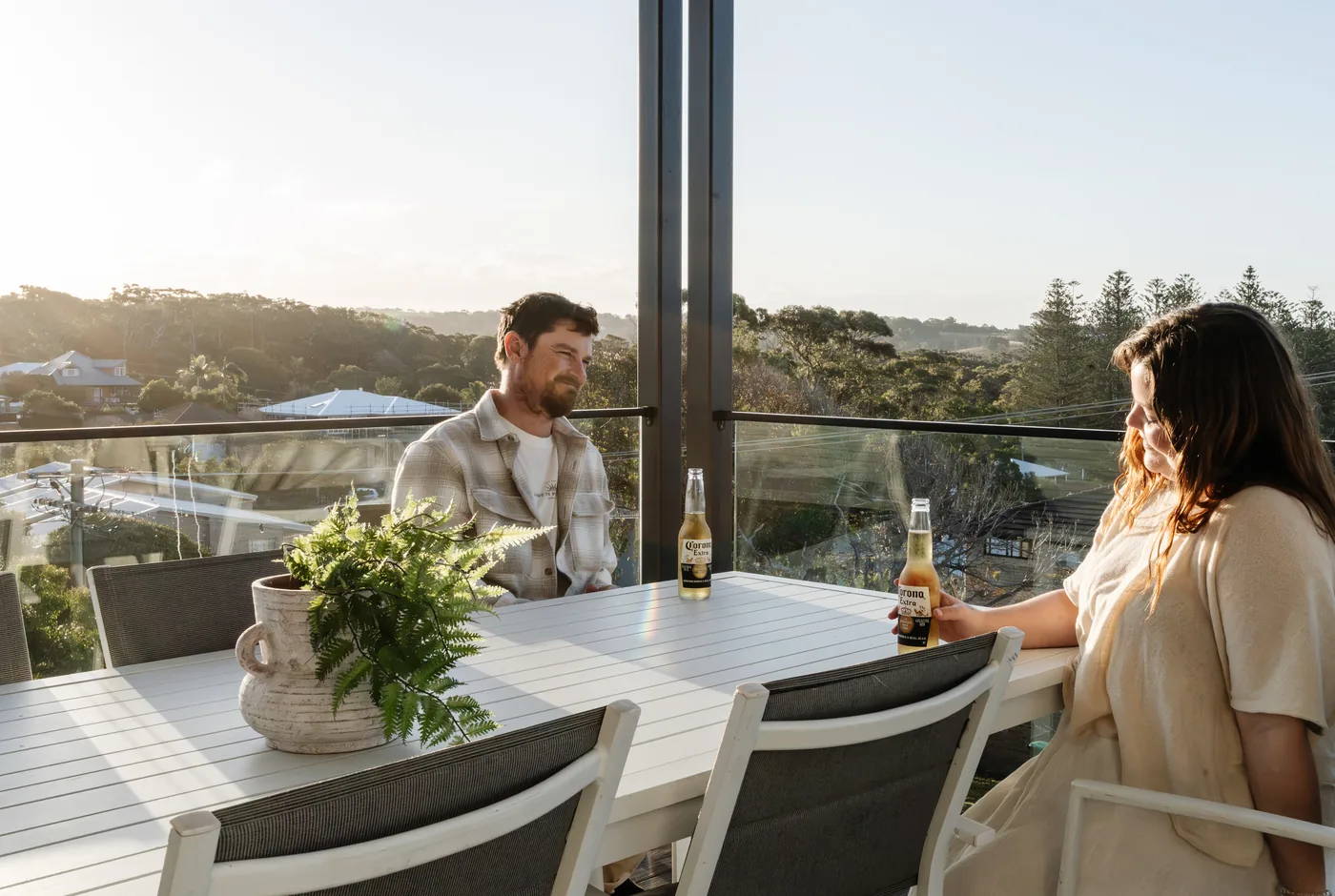 Sundowners on the deck overlooking the ocean