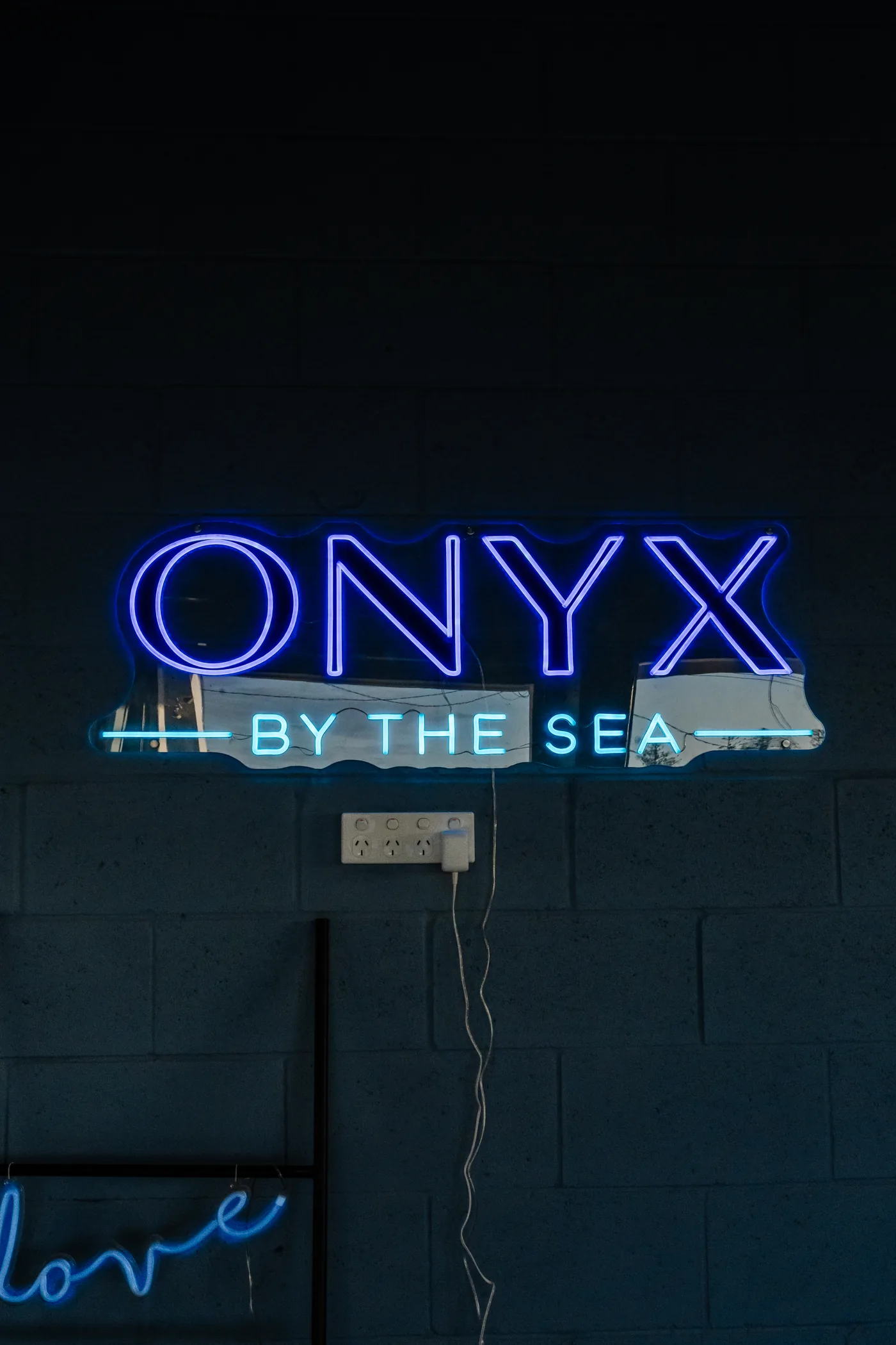 Onyx By the Sea neon sign in the man cave